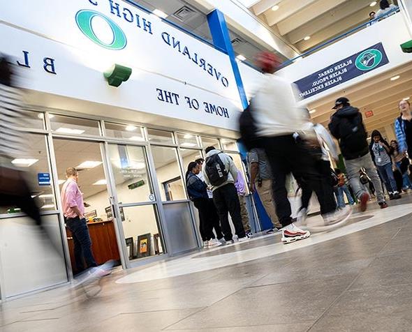 students walking through overland high school