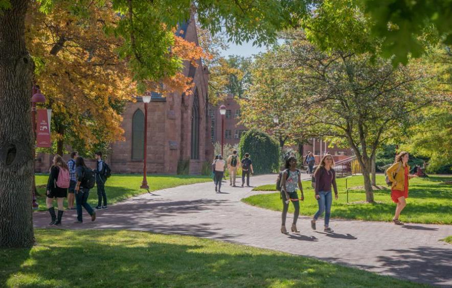 students walking through campus